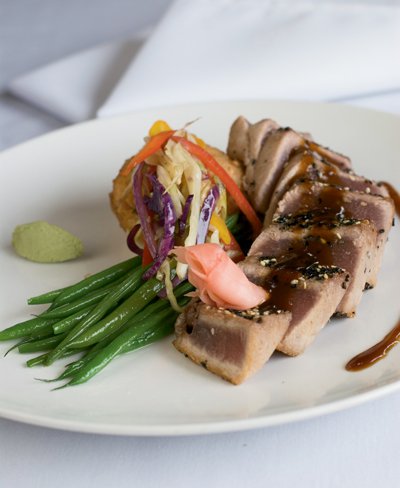 Seasame-seared tuna with tamarind sauce and asian slaw